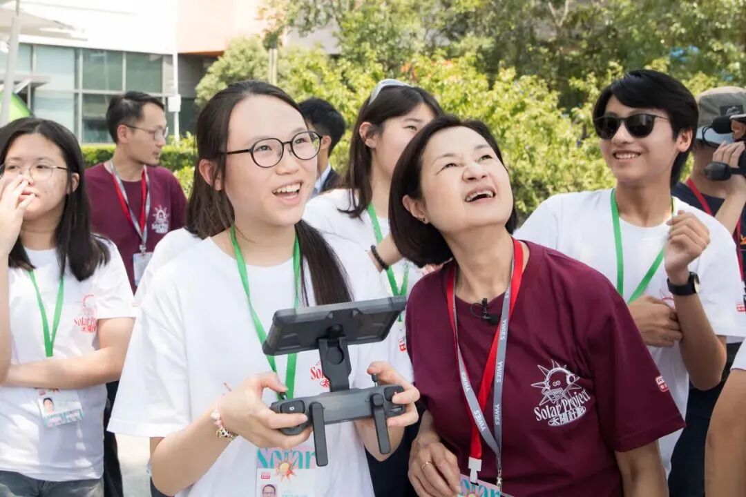 Instructor supports students with drone operation and data analysis at YWIES Zhejiang Tongxiang