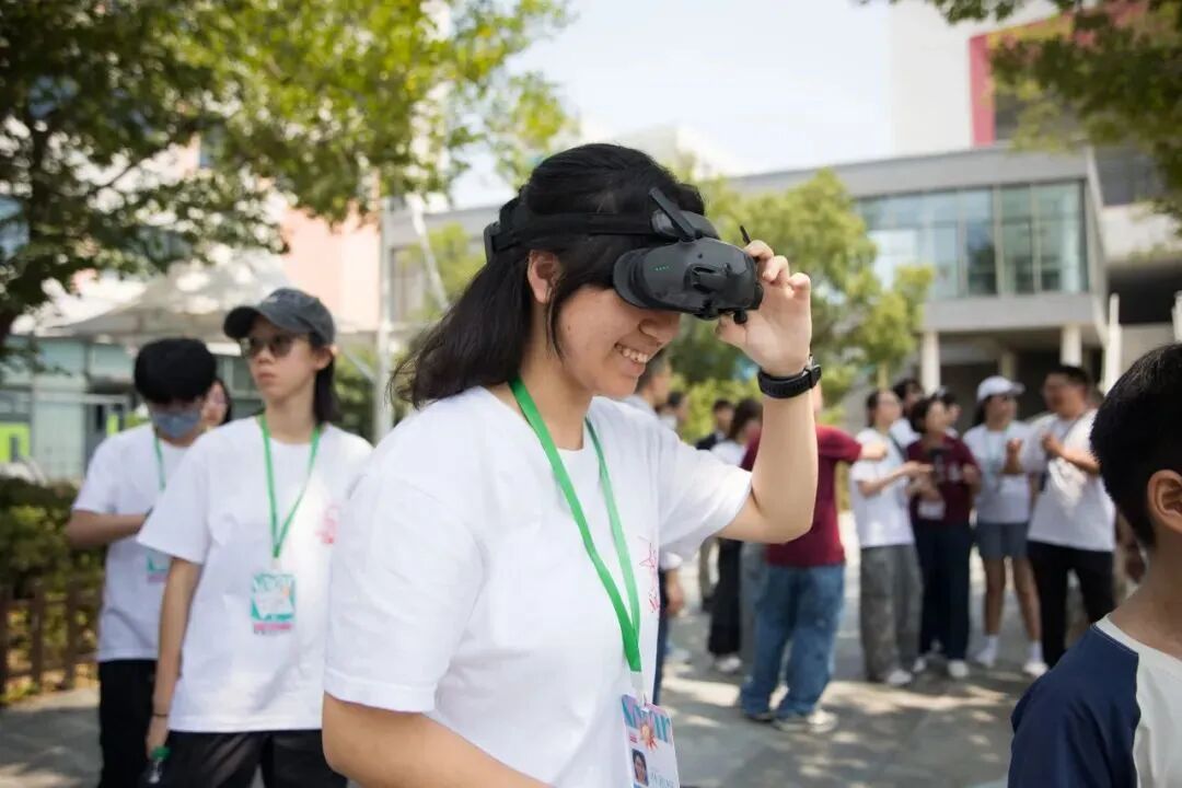 Participants program drones and test flight paths at YWIES Zhejiang Tongxiang